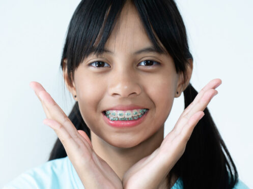 a little girl wear braces