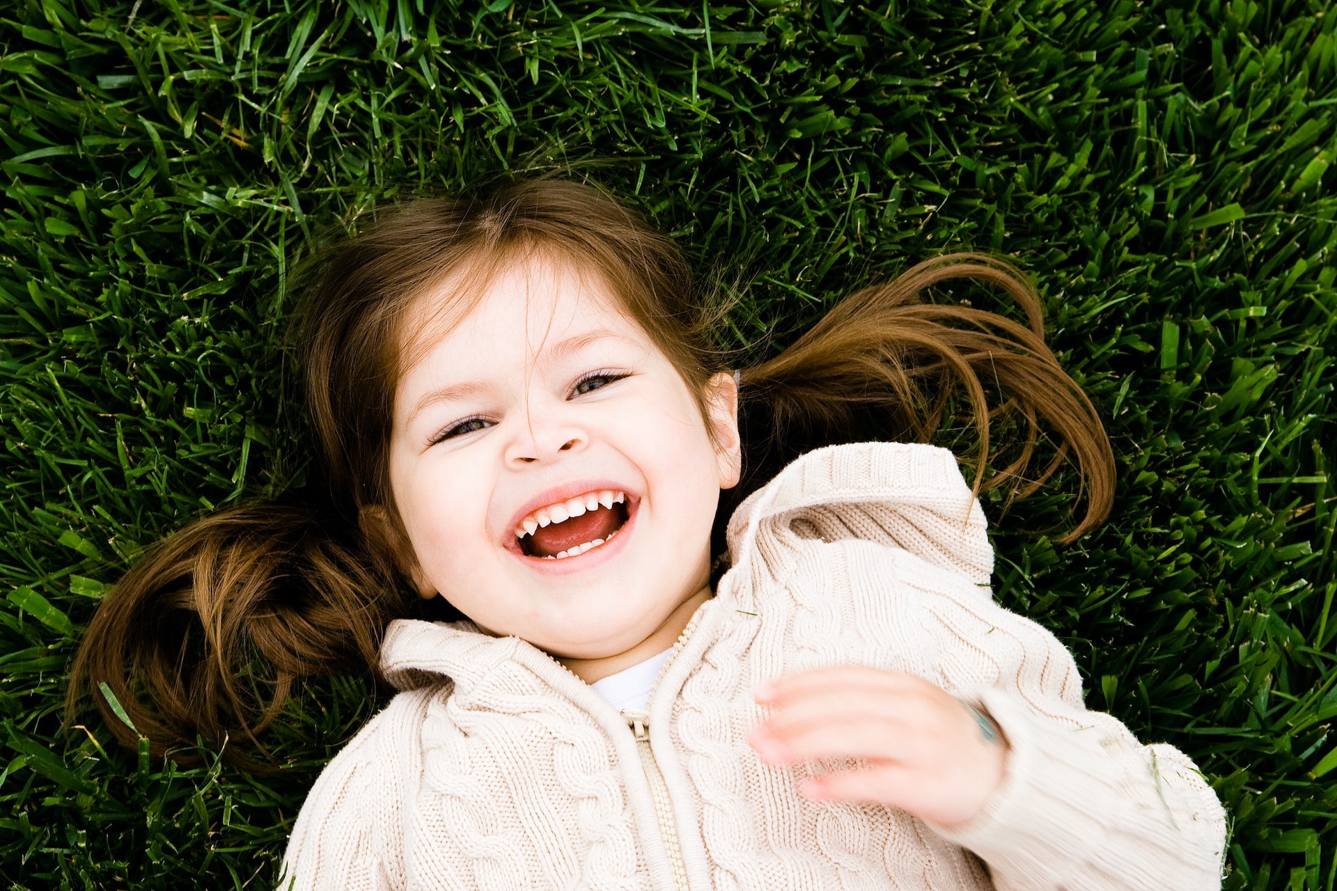 cute kid on the grass