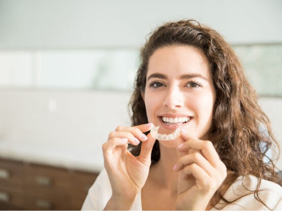 woman wearing invisalign